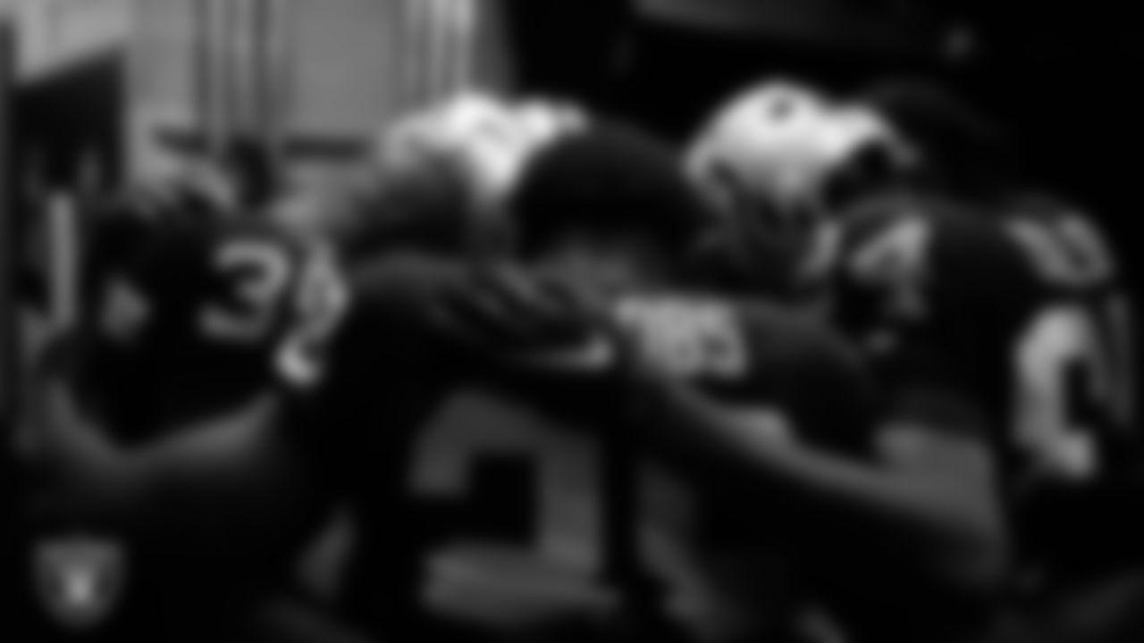 The Las Vegas Raiders returners huddle in the tunnel before the regular season home game against the Denver Broncos at Allegiant Stadium.