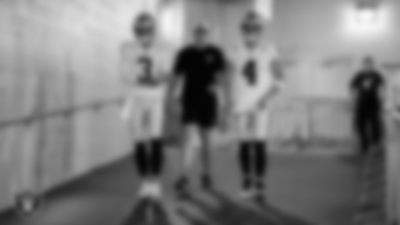 Las Vegas Raiders quarterback Jarrett Stidham (3), quarterback Chase Garbers (15) and quarterback Derek Carr (4) walk down the tunnel before the regular season away game against the Tennessee Titans at Nissan Stadium.