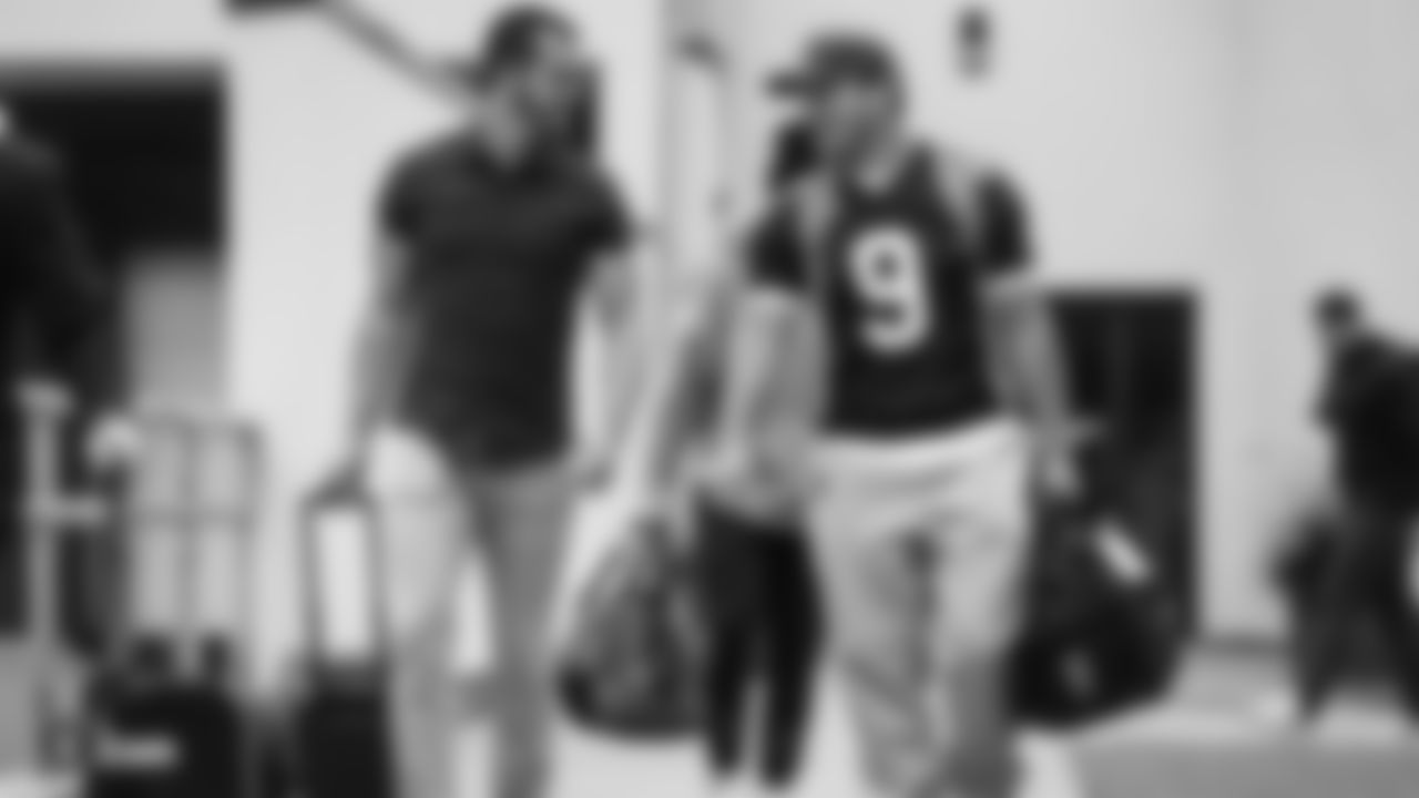 Raiders quarterback Derek Carr (4) and fullback Alec Ingold (45) leave the hotel before the regular season game against the Green Bay Packers at Lambeau Field.