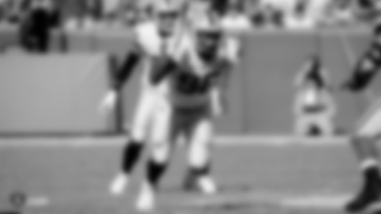 Raiders defensive end Clelin Ferrell (96) rushes the quarterback during the regular season game against the Green Bay Packers.