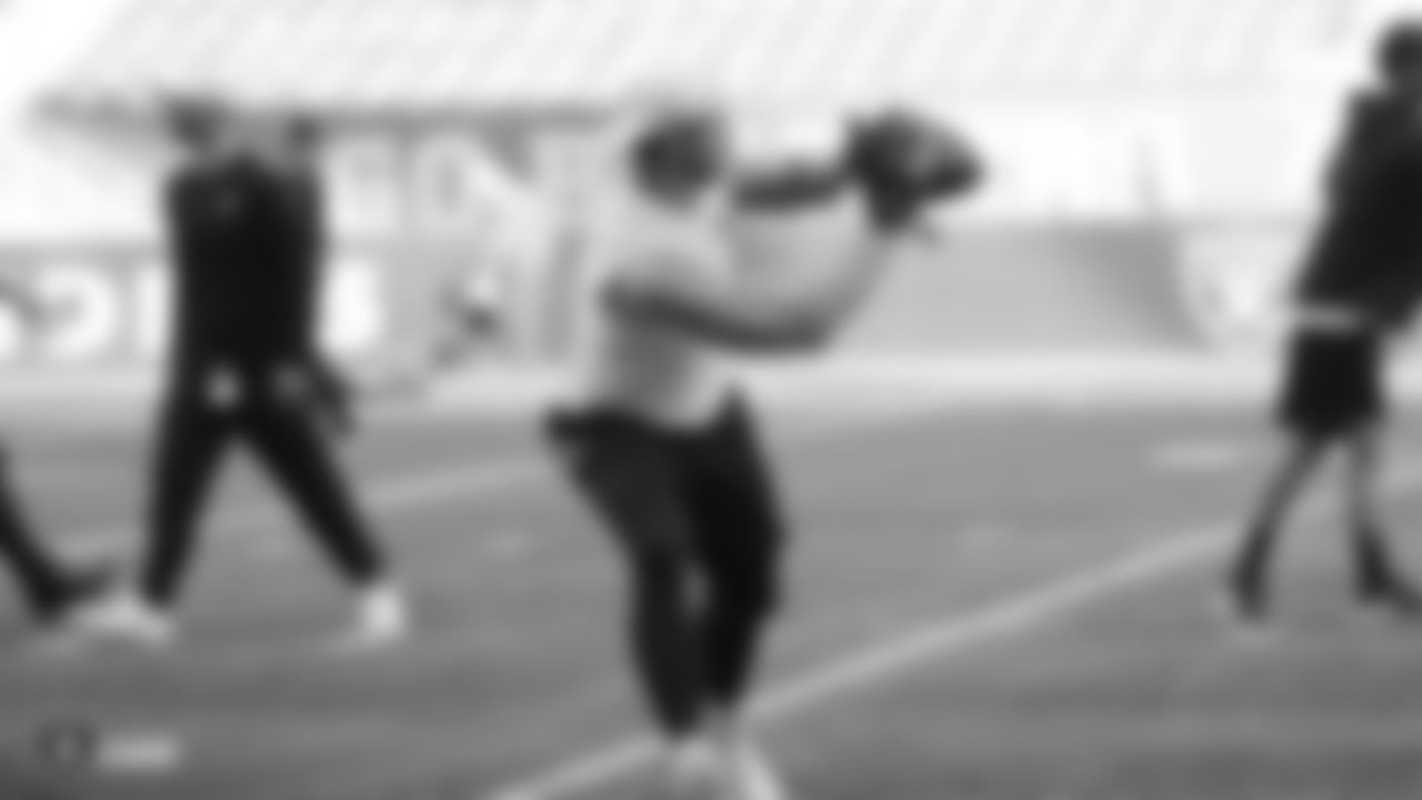 The Raiders warm up before their preseason game against the Green Bay Packers at IG Field.