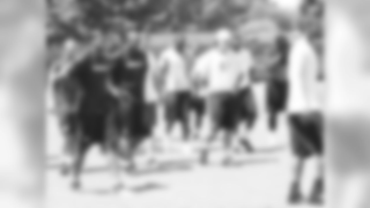 Players, including RB Darren McFadden, walking it out