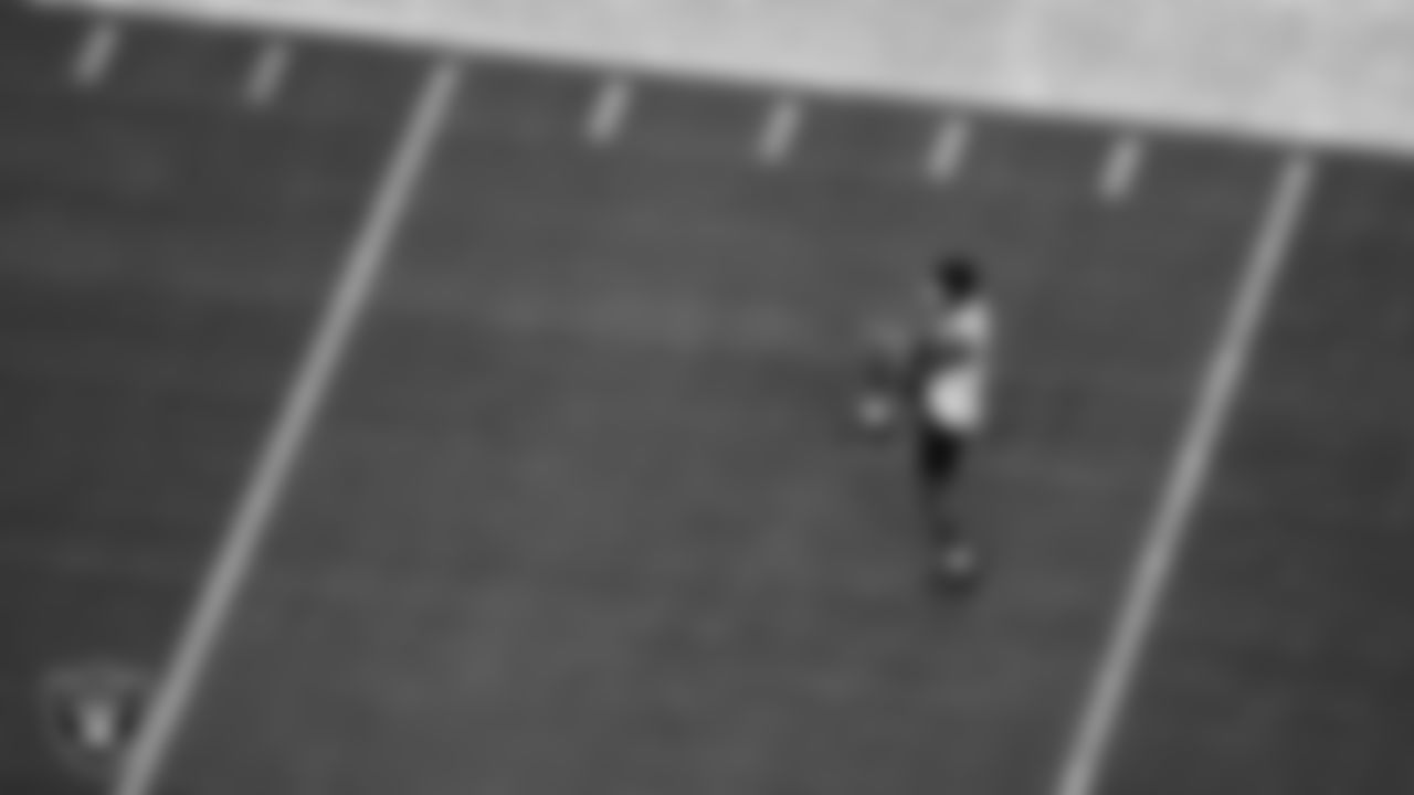 The Raiders warm up before the regular season game against the Indianapolis Colts at Allegiant Stadium.