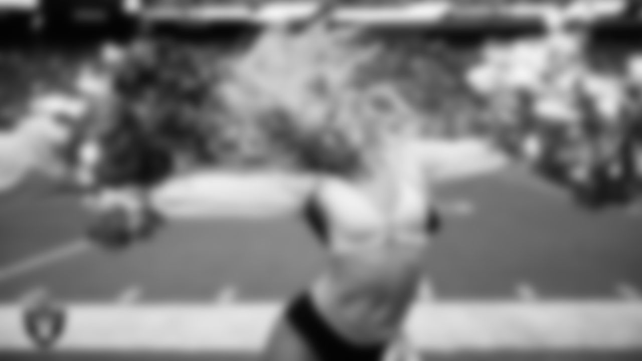 Raiderette Kennedy performs on the sidelines during the regular season home game against the Denver Broncos at Allegiant Stadium.