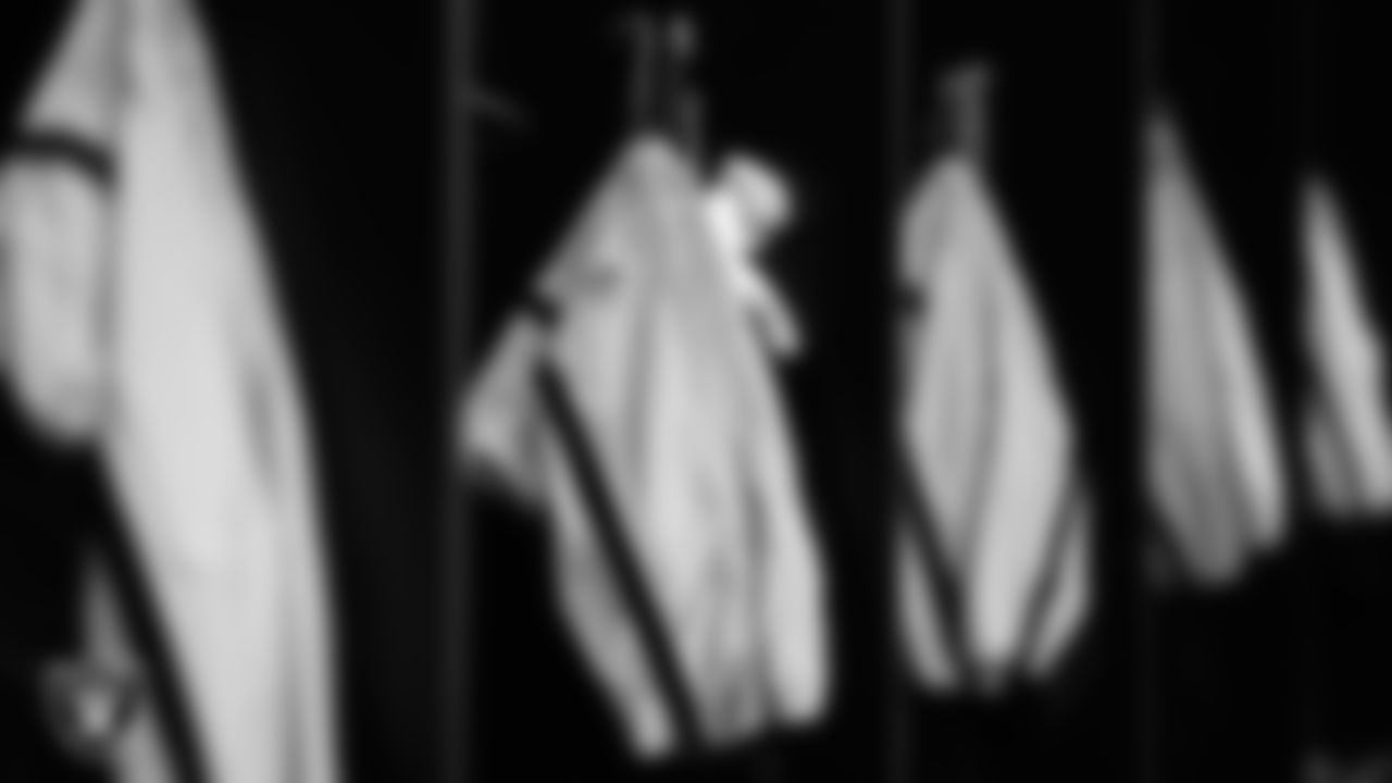 Pairs of pants hang in the locker room prior to the Raiders' arrival for their preseason home game against the San Francisco 49ers at Allegiant Stadium.