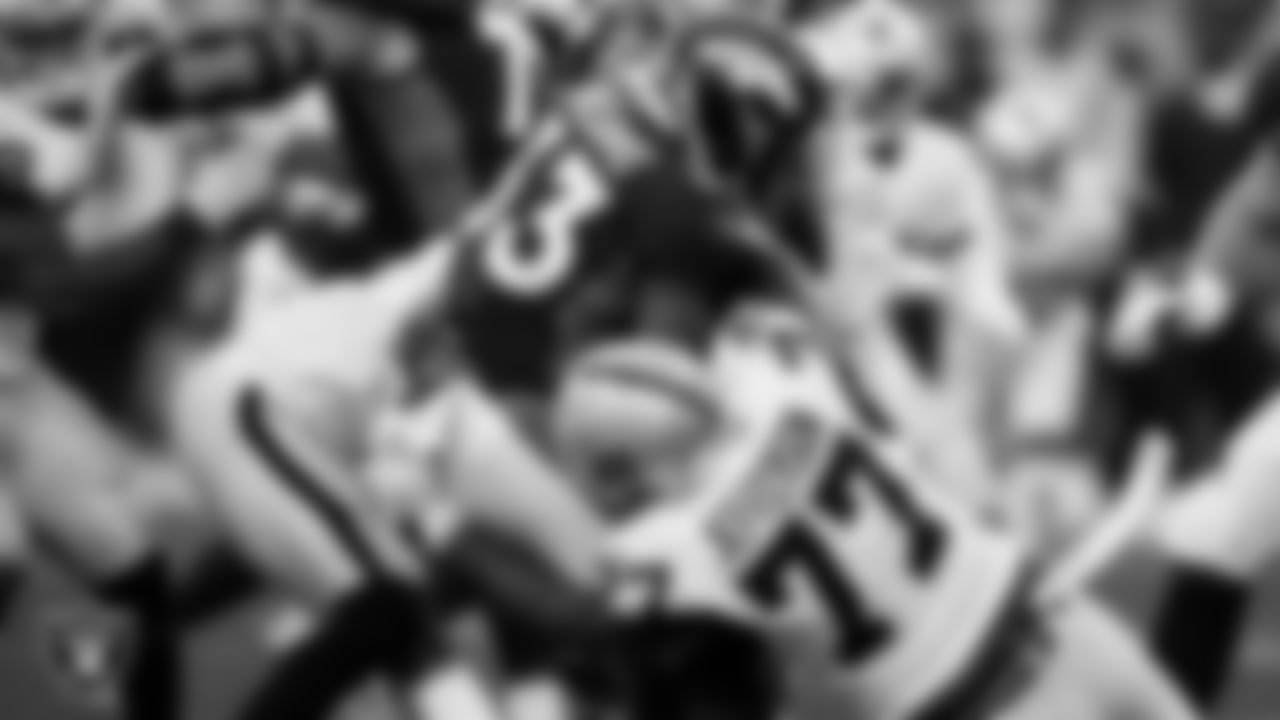 Las Vegas Raiders defensive tackle Quinton Jefferson (77) makes a tackle during the regular season away game against the Denver Broncos.