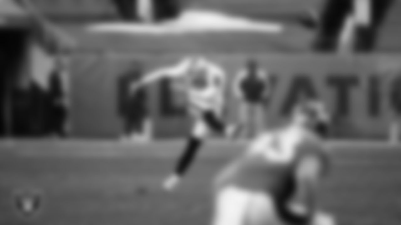Las Vegas Raiders kicker Daniel Carlson (2) kicks off during the regular season away game against the Denver Broncos.
