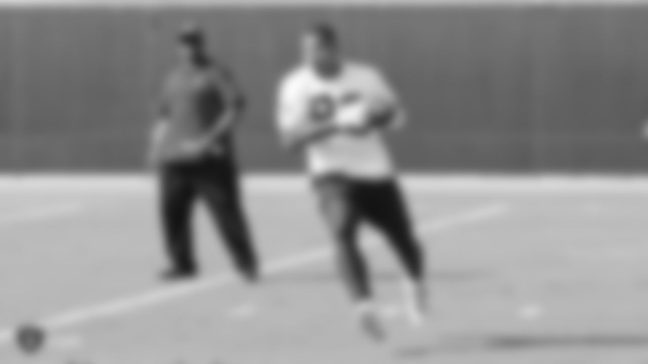 Raiders wide receivers coach Edgar Bennett and tight end Darren Waller (83) at a workout during phase two of the offseason program at the Raiders Practice Facility, in Alameda, Calif.