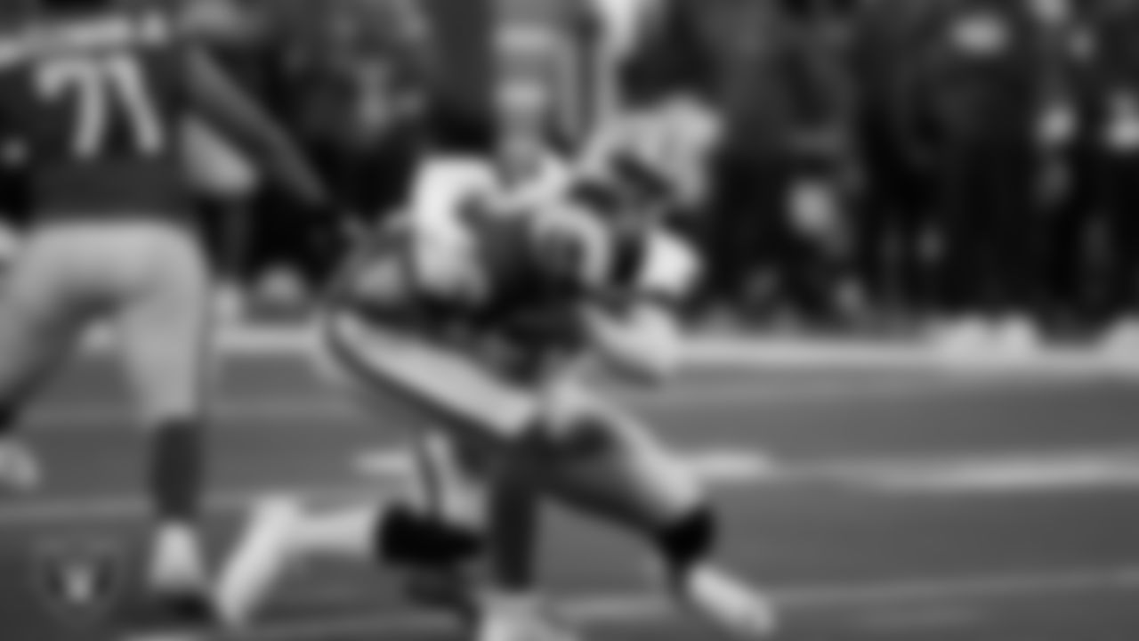 Las Vegas Raiders defensive lineman David Agoha (62) sacks the quarterback during the preseason away game against the Los Angeles Rams at Sofi Stadium.