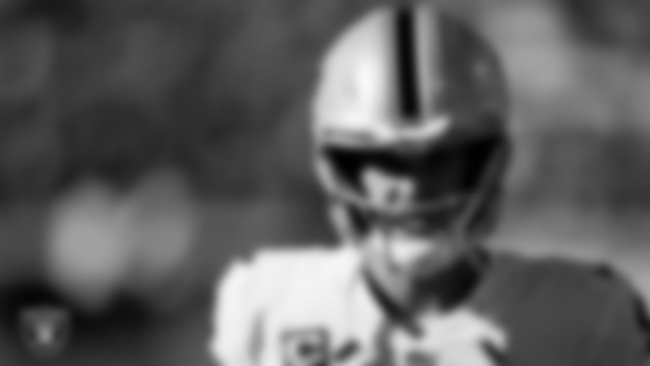 Las Vegas Raiders quarterback Derek Carr (4) on the sidelines during the regular season away game against the Kansas City Chiefs.