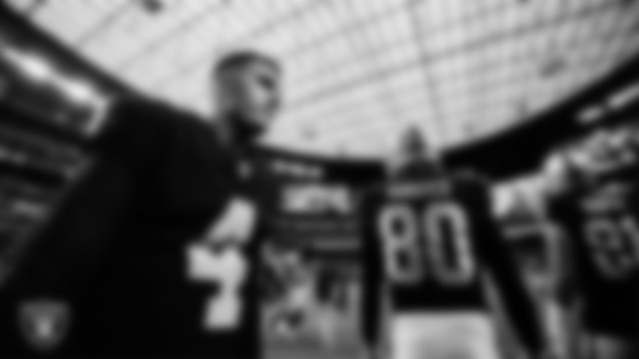 Las Vegas Raiders quarterback Aidan O'Connell (4) warming up before the regular season home game against the Green Bay Packers at Allegiant Stadium.