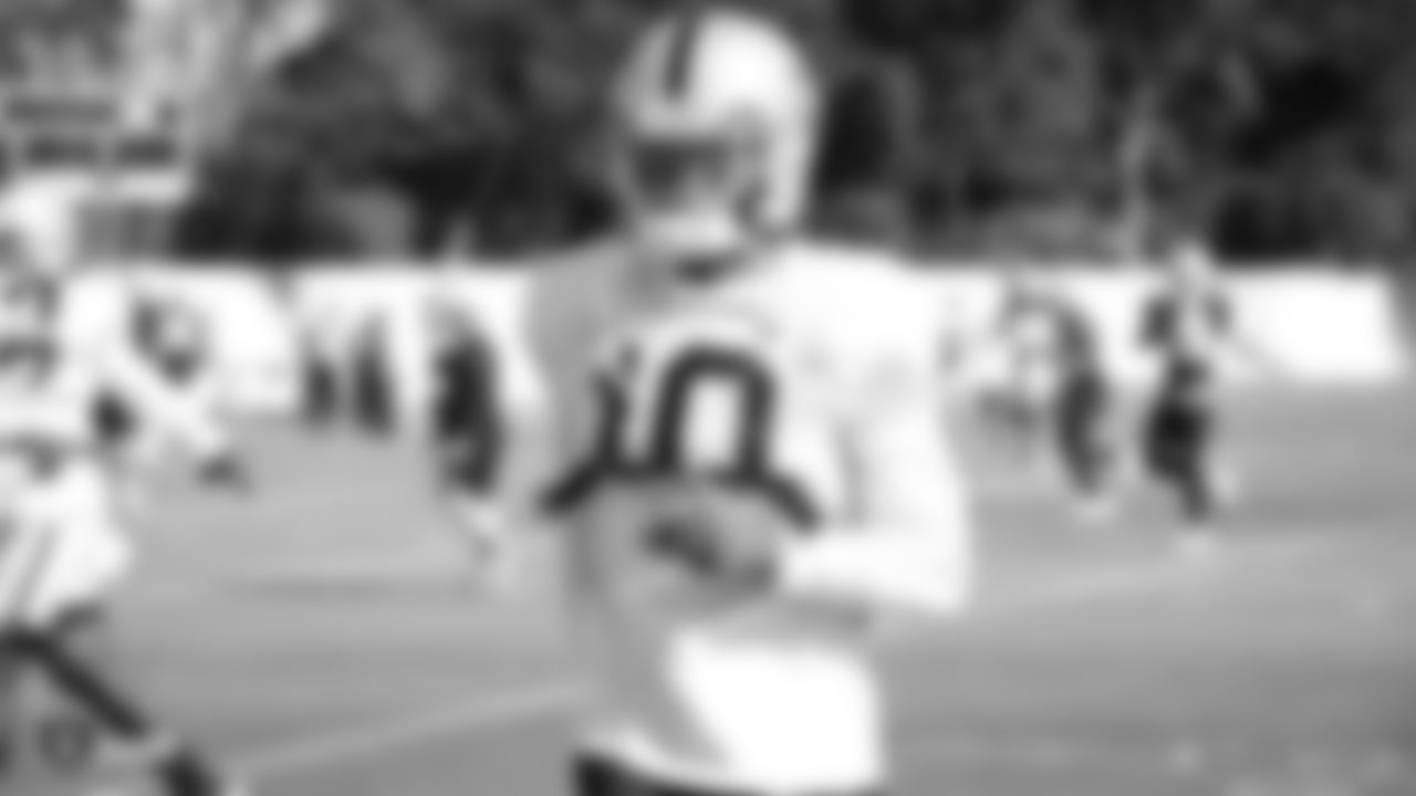 Raiders wide receiver Rico Gafford (10) warms up during practice.