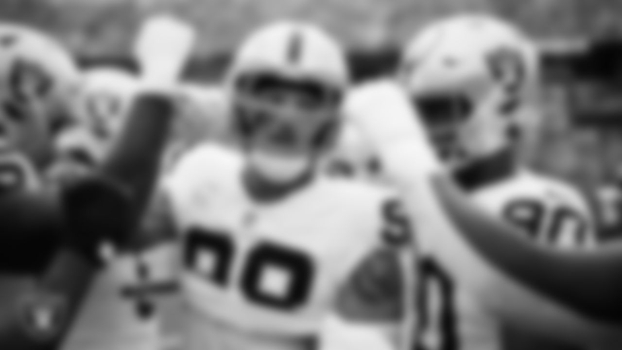 Las Vegas Raiders defensive end Maxx Crosby (98) leads a huddle before the regular season away game against the Buffalo Bills at Highmark Stadium.