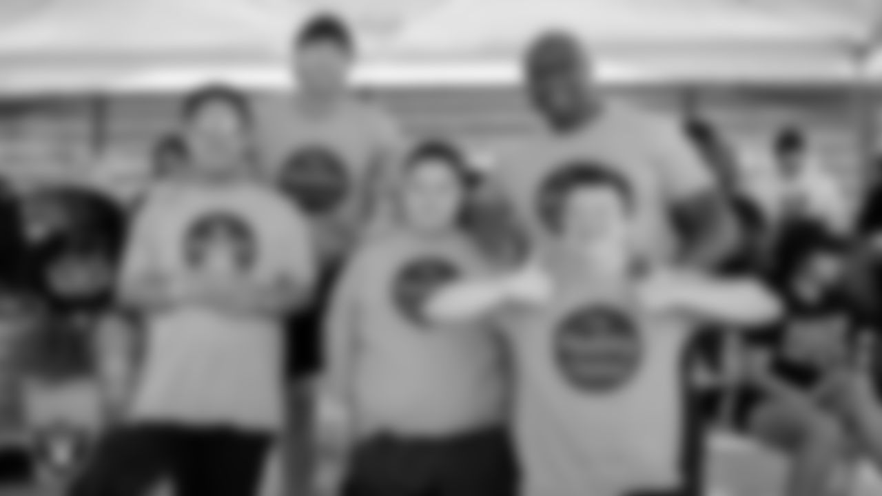 Members of the Ability Center of Southern Nevada pose for a photo during practice at 2023 Training Camp at Intermountain Health Performance Center.