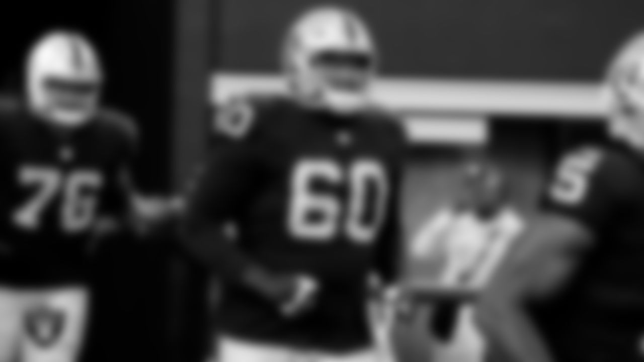 Las Vegas Raiders guard Jordan Simmons (60) walks down the tunnel before the regular season away game against the Dallas Cowboys.