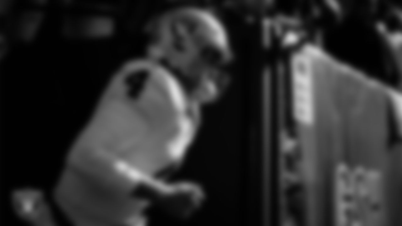 Las Vegas Raiders quarterback Aidan O'Connell (4) walks down the tunnel before the regular season away game against the Chicago Bears at Soldier Field.
