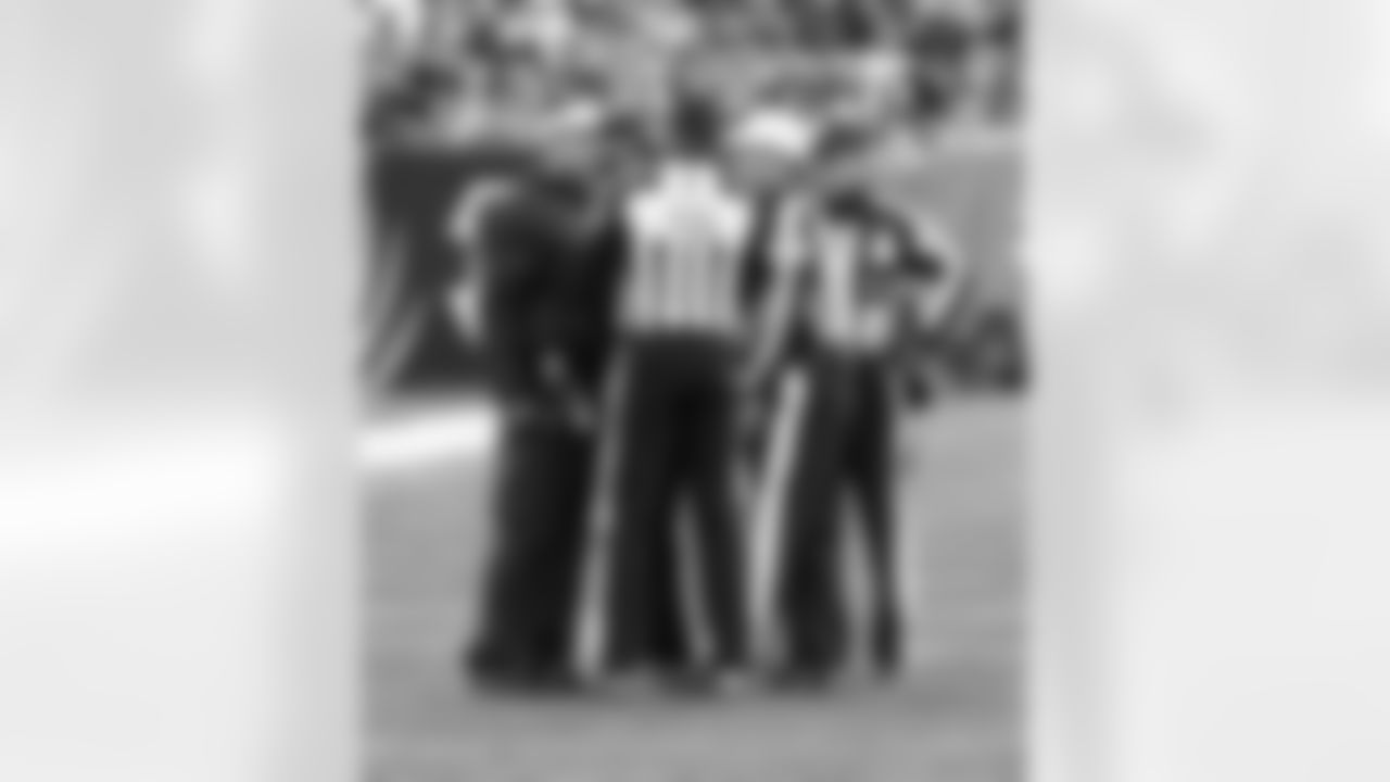 Head Coach Dennis Allen gets the explanation from the referees.