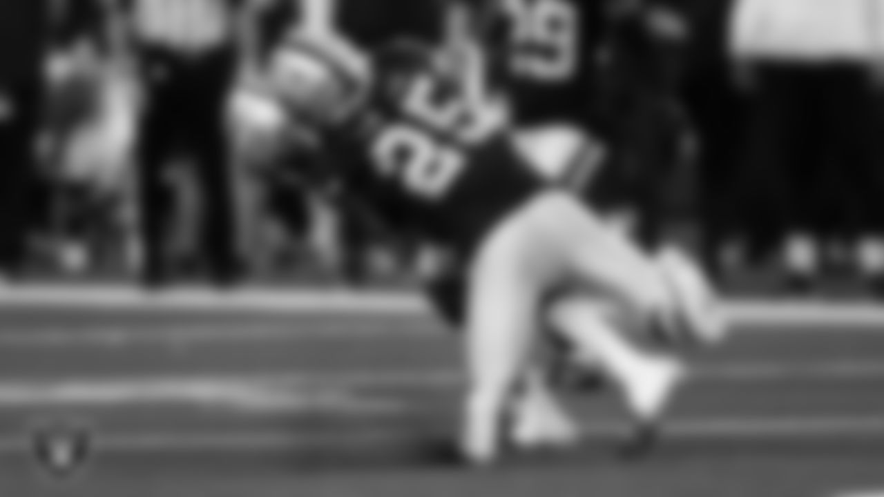 Las Vegas Raiders safety Tre'von Moehrig (25) makes a tackle during the regular season away game against the Dallas Cowboys.