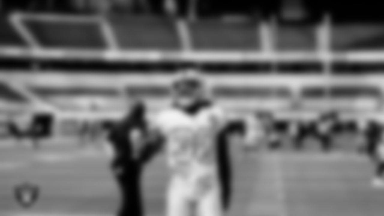 The Raiders warm up before the regular season game against the Los Angeles Chargers at SoFi Stadium.