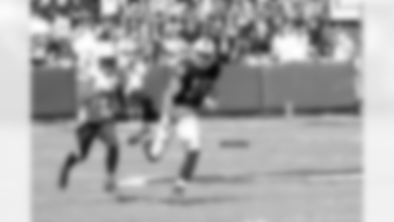QB Derek Carr connects with WR Andre Holmes on the third play of the game.