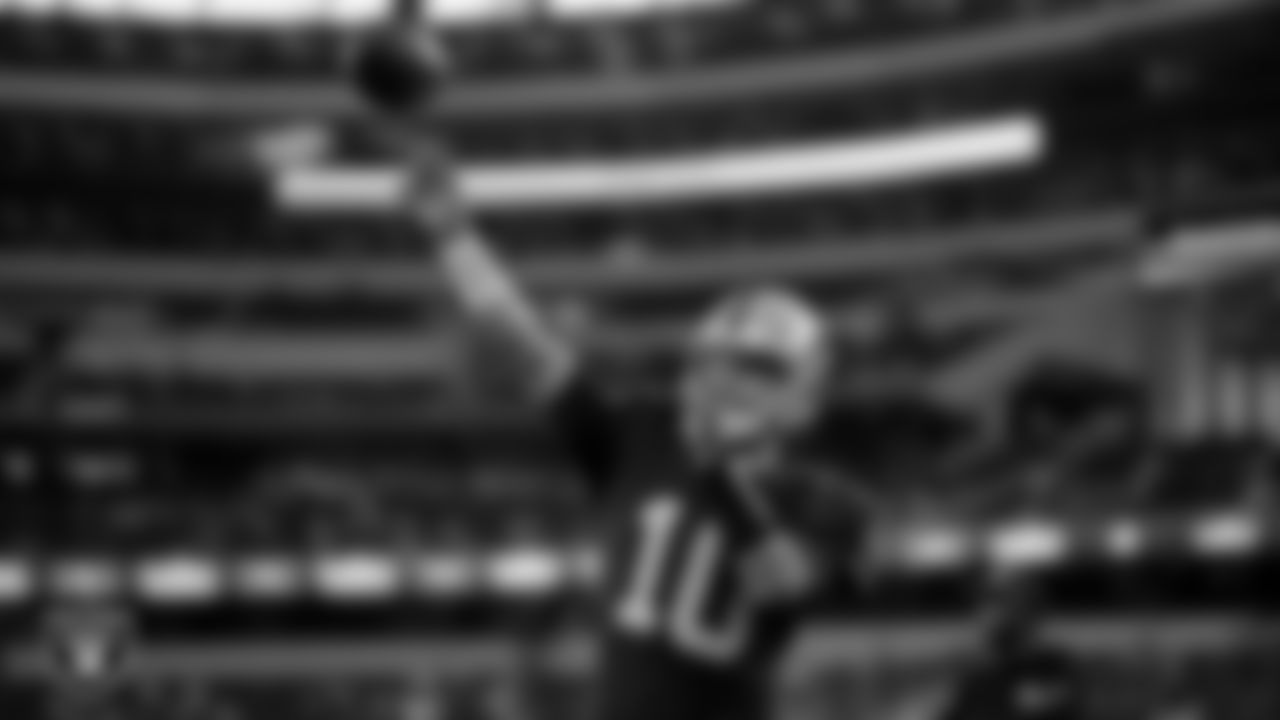 Las Vegas Raiders quarterback Jimmy Garoppolo (10) warming up before the preseason away game against the Dallas Cowboys at AT&T Stadium.