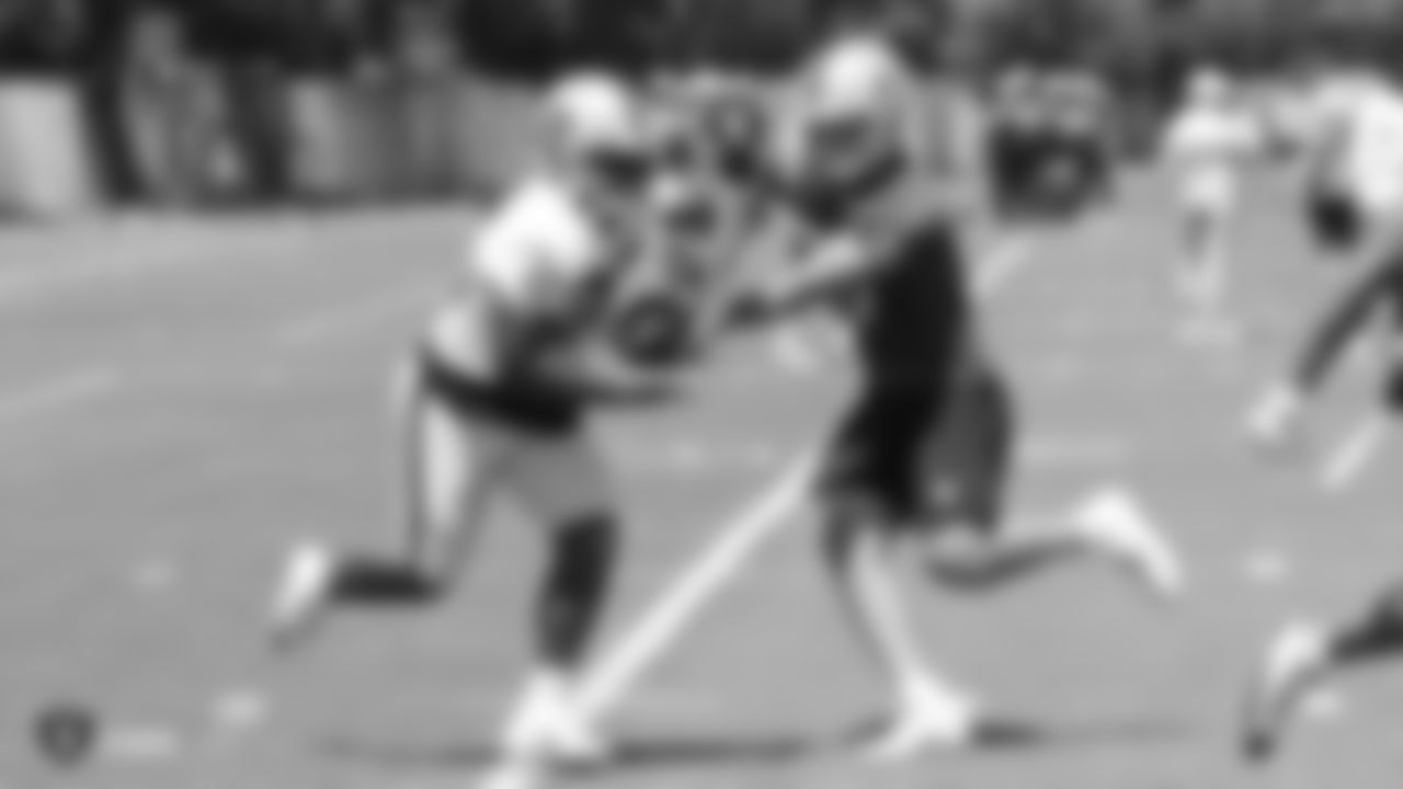 Raiders running back Jalen Richard (30) and quarterback Nathan Peterman (3) at a Mandatory Minicamp at the Raiders Practice Facility in Alameda, Calif.