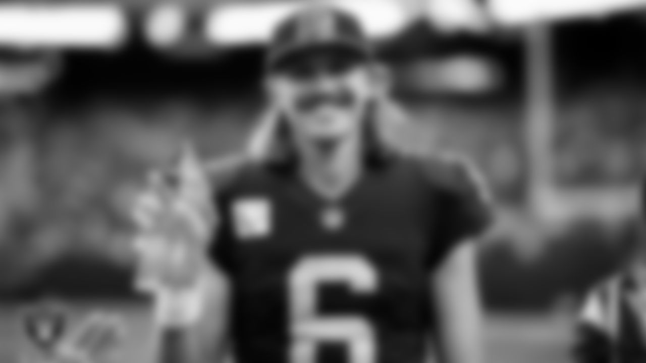 Las Vegas Raiders punter AJ Cole is awarded the nomination as the Las Vegas Raiders' Walter Payton Man of the Award on the field before the Las Vegas Raiders regular season home game against the New England Patriots at Allegiant Stadium.