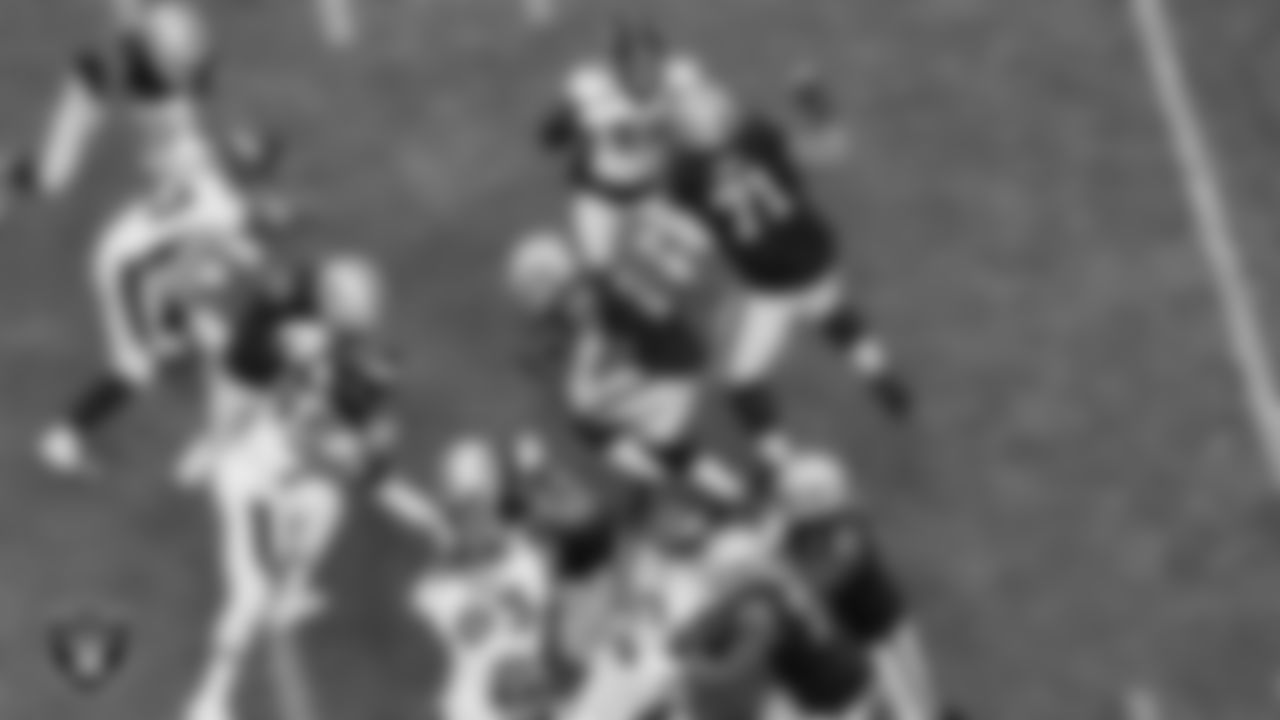 Las Vegas Raiders tackle Brandon Parker (75), center Rodney Hudson (61), tackle Sam Young (70), running back Josh Jacobs (28), tackle Denzelle Good (71) and tight end Darren Waller (83) during the regular season game against the Denver Broncos at Allegiant Stadium.