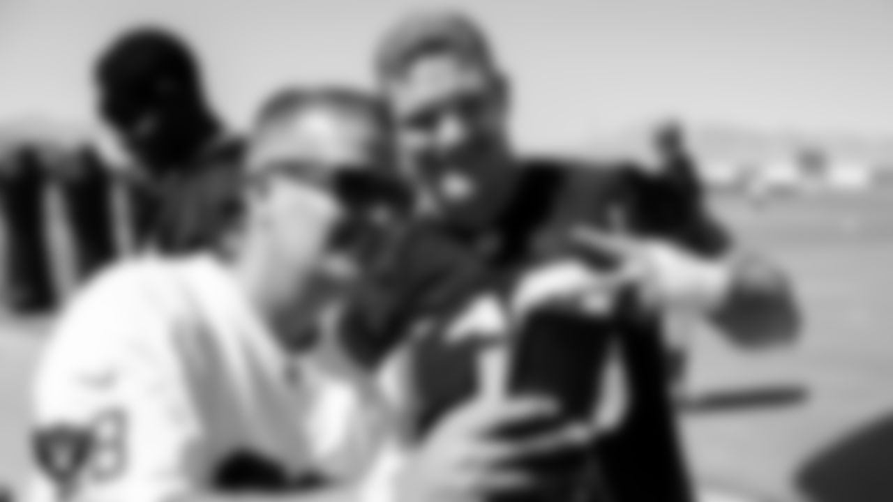 Las Vegas Raiders defensive end George Tarlas (79) poses for a selfie with fans after practice at 2023 Training Camp at Intermountain Health Performance Center.