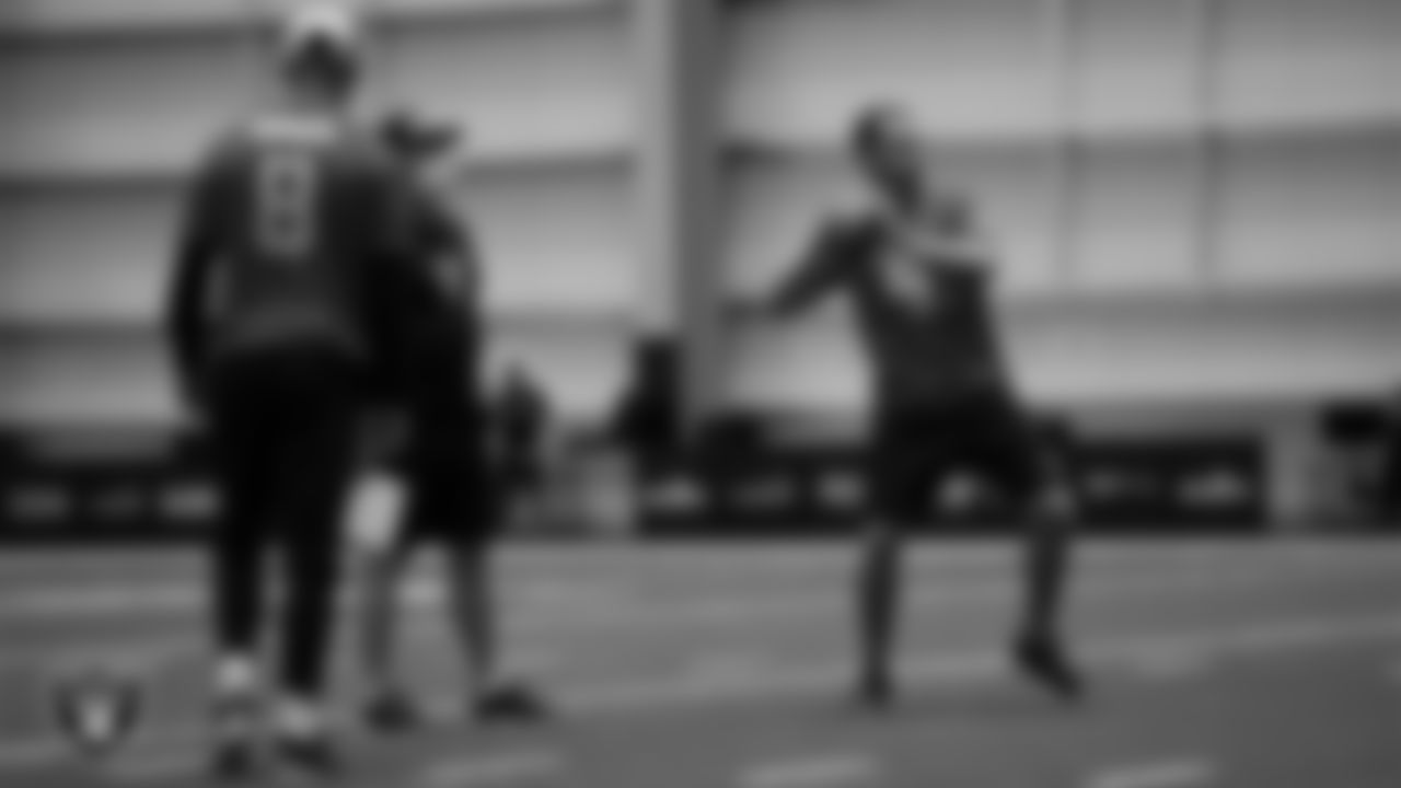 Las Vegas Raiders quarterback Marcus Mariota (8), Head Coach Jon Gruden and quarterback Derek Carr (4) on the field for a walk through at 2020 Training Camp