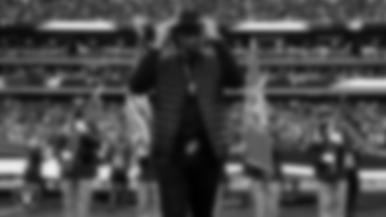 Pastor, singer, songwriter, and record producer, Montell Jordan, performs the national anthem, while the Las Vegas Metropolitan Police Department presents the nation's colors, before the Las Vegas Raiders' regular season home game against the Denver Broncos at Allegiant Stadium.