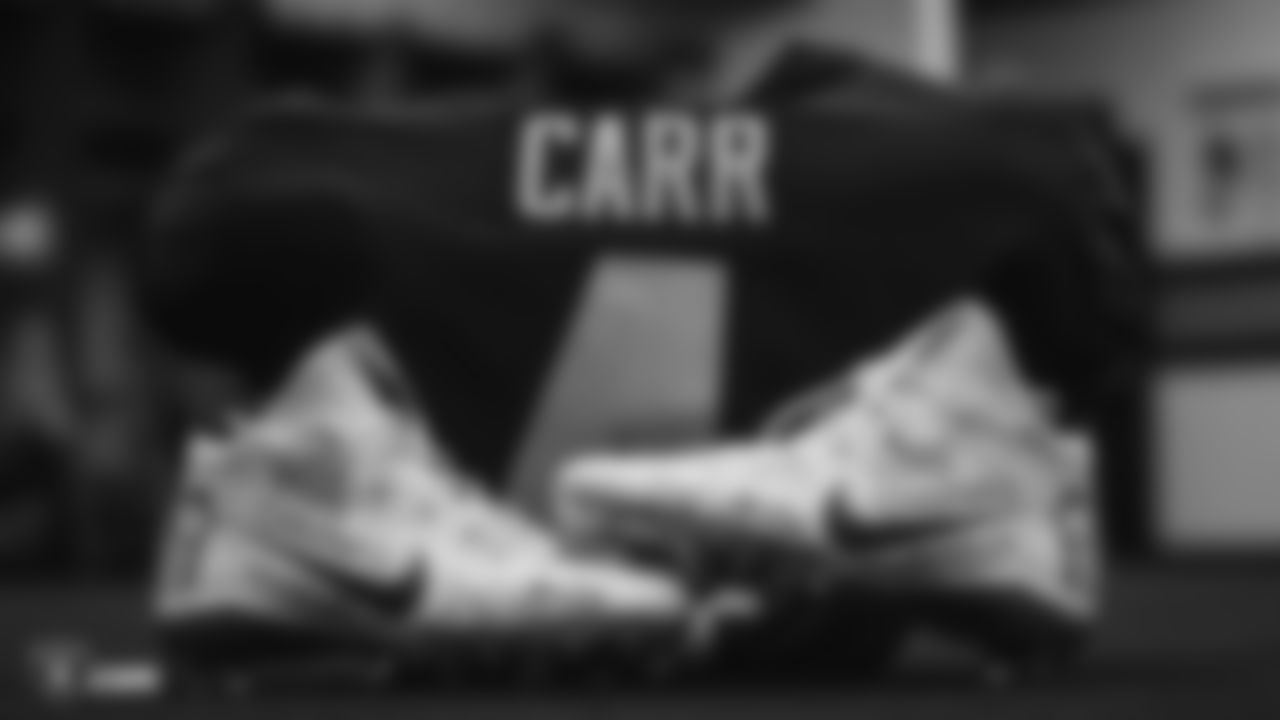 Raiders quarterback Derek Carr's (4) custom cleats for the NFL's My Cause My Cleats campaign in the locker room prior to the Raiders arrival for their regular season game against the Tennessee Titans. Derek Carr wears these cleats in support of Valley Children's Hospital.
