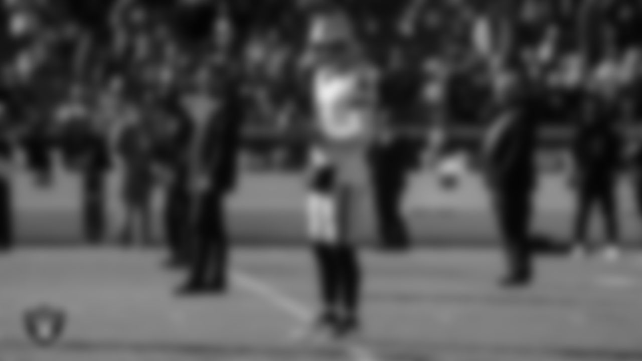 Las Vegas Raiders quarterback Derek Carr (4) warming up before the regular season away game against the Kansas City Chiefs at Arrowhead Stadium.