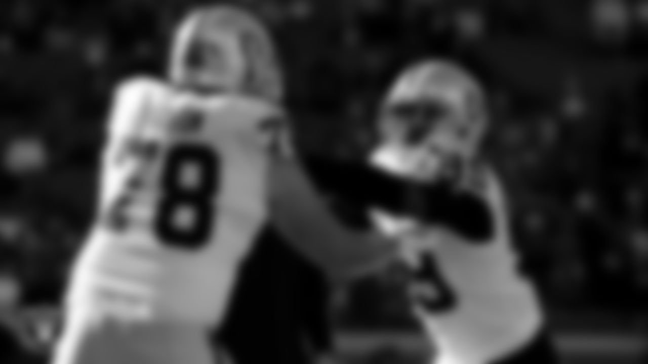 Las Vegas Raiders tackle Jackson Barton (78) and defensive end Clelin Ferrell (99) warming up before the regular season away game against the Kansas City Chiefs at Arrowhead Stadium.