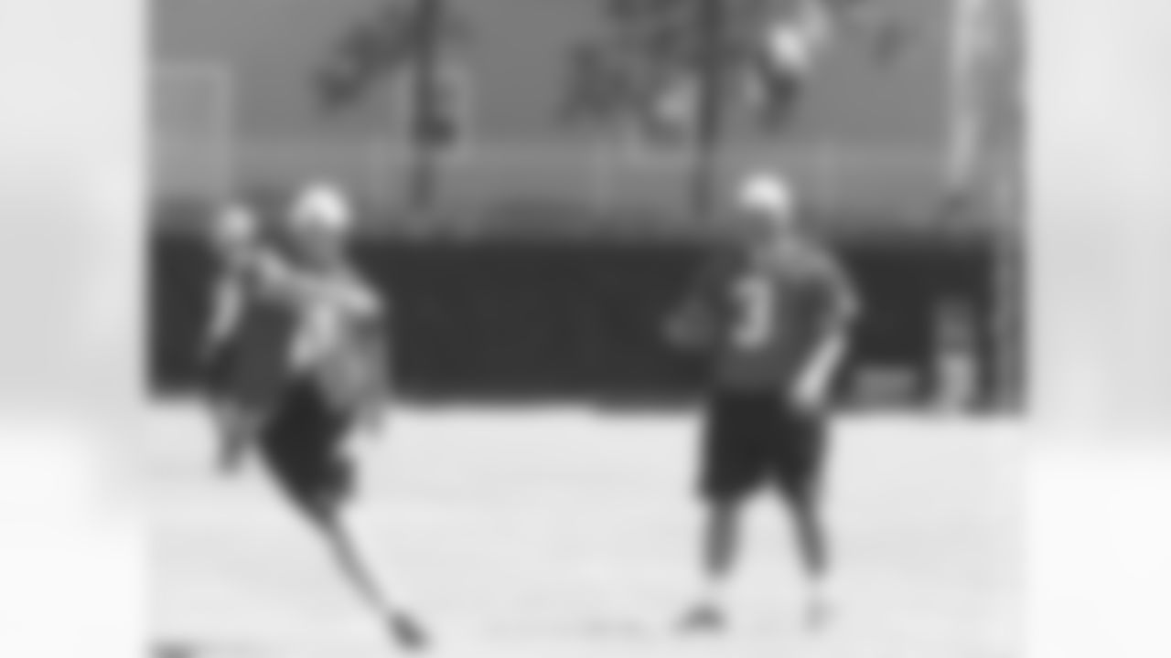 K Sebastian Janikowski kicks a ball