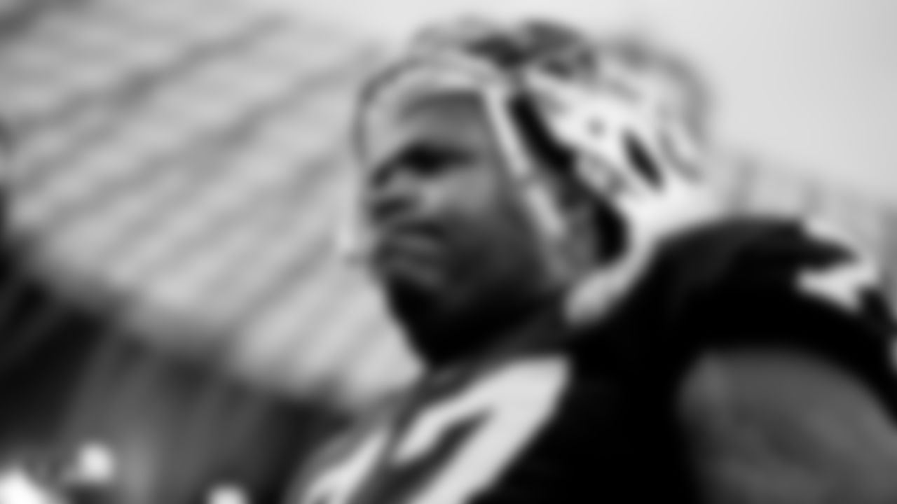 Raiders tackle Trent Brown (77) warming up before the regular season game against the Chicago Bears.
