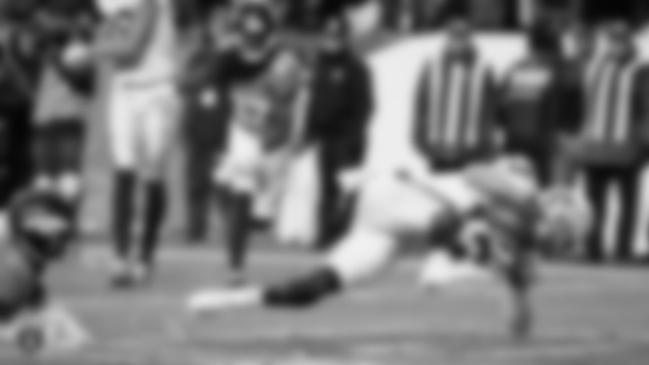 The Raiders during the regular season game against the Denver Broncos at Empower Field at Mile High.