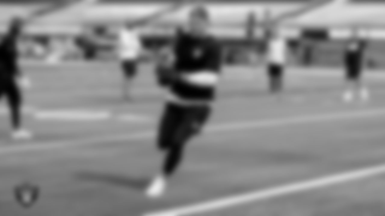 The Raiders warm up before the regular season game against the Los Angeles Chargers at SoFi Stadium.