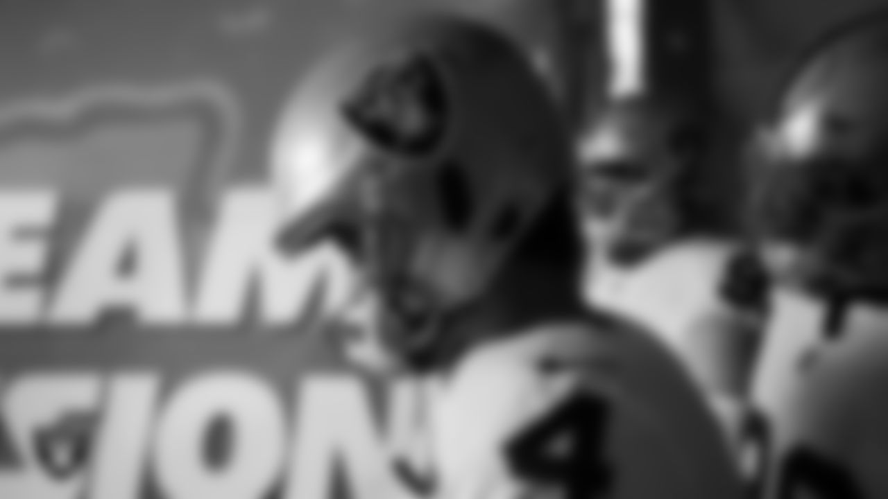 Las Vegas Raiders quarterback Derek Carr (4) waits to be introduced onto the field before the regular season away game against the Kansas City Chiefs.