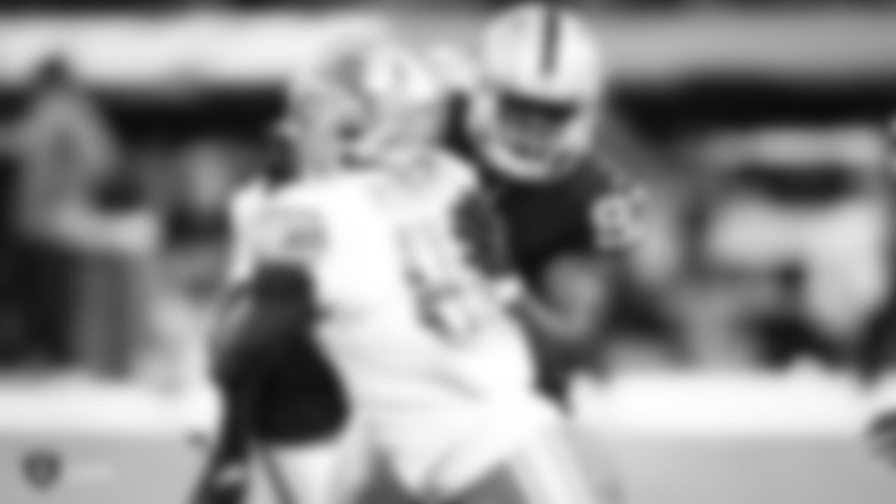 Oakland Raiders defensive end Mario Edwards Jr. (97) fights through the Detroit Lions offense during The Oakland Raiders preseason game against the Detroit Lions at Oakland-Alameda County Coliseum, Friday, August 10, 2018, in Oakland, California. The Oakland Raiders won 16-10.