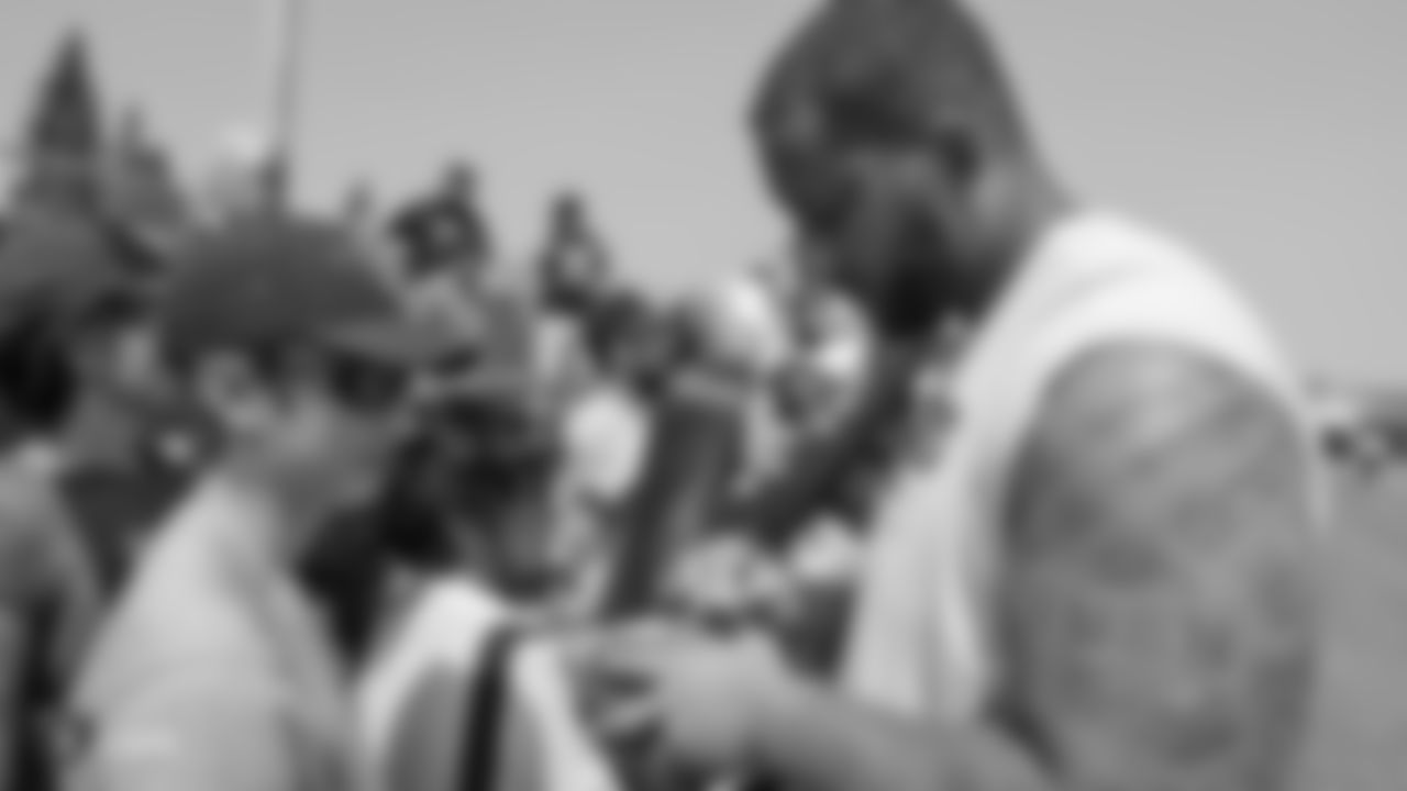 Oakland Raiders offensive lineman Ian Silberman (67) signs autographs for fans after practice at 2018 Training Camp at The Oakland Raiders Napa Valley Training Complex, Friday, August 3, 2018, in Napa, California.
