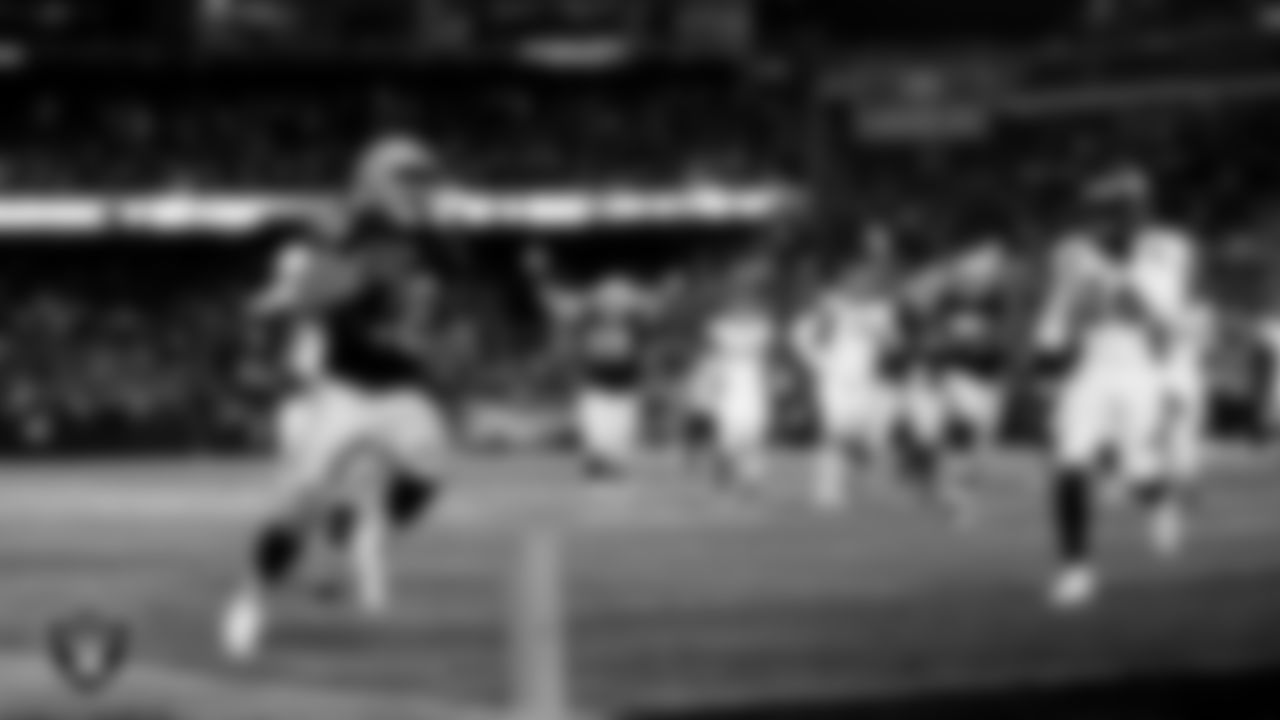 Raiders running back Doug Martin (28) ruses for a 24-yard touchdown during the regular season home game against the Denver Broncos at O.co Coliseum, Monday, December 24, 2018, in Oakland, Calif.
