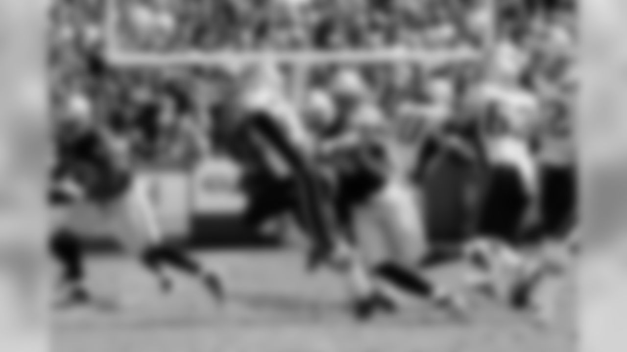 DE Jarvis Moss brings down RB Stevan Ridley for a loss.
