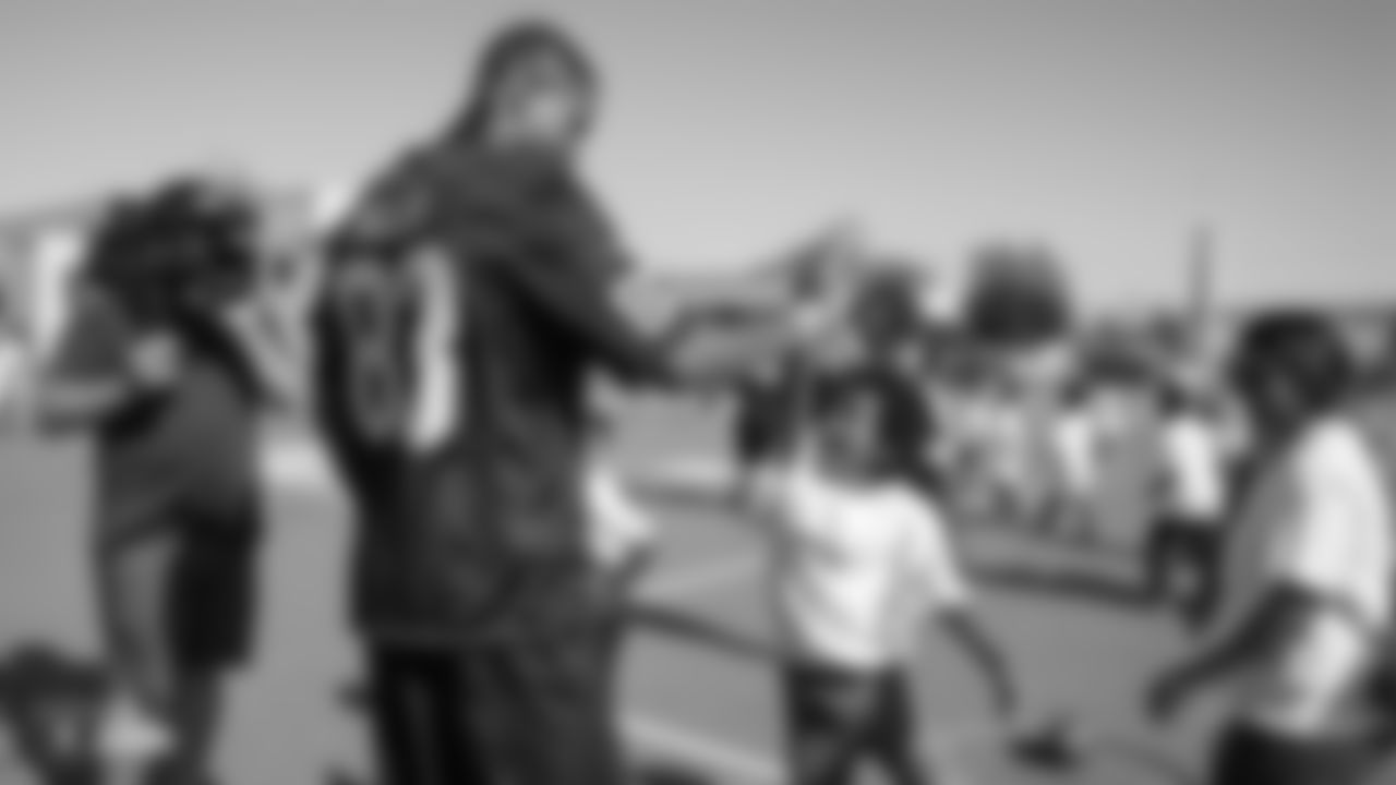 The Oakland Raiders, represented by players Alec Ingold, Isaiah Johnson, Trent Sieg, Darren Waller, and Kyle Wilber, along with the Raiderettes, collaborate with Playworks to promote Play 60's message to students of being active for sixty minutes everyday.