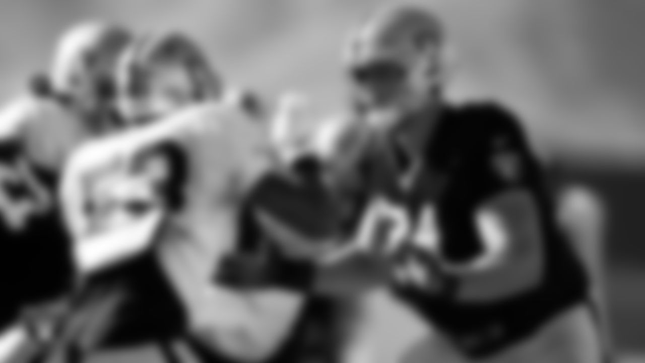 Las Vegas Raiders linebacker Javin White (53) and tackle Kolton Miller (74) during practice at Intermountain Healthcare Performance Center.