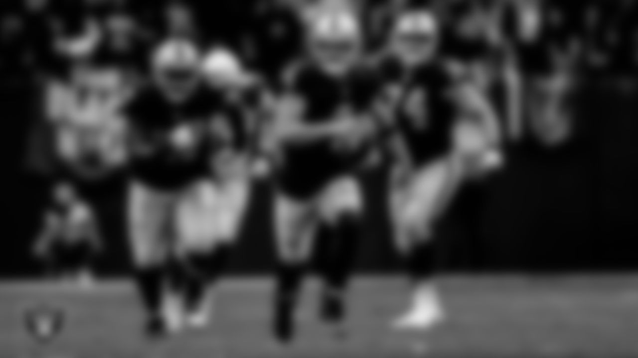 Las Vegas Raiders quarterback Derek Carr (4) rushes during the regular season home game against the Arizona Cardinals at Allegiant Stadium.
