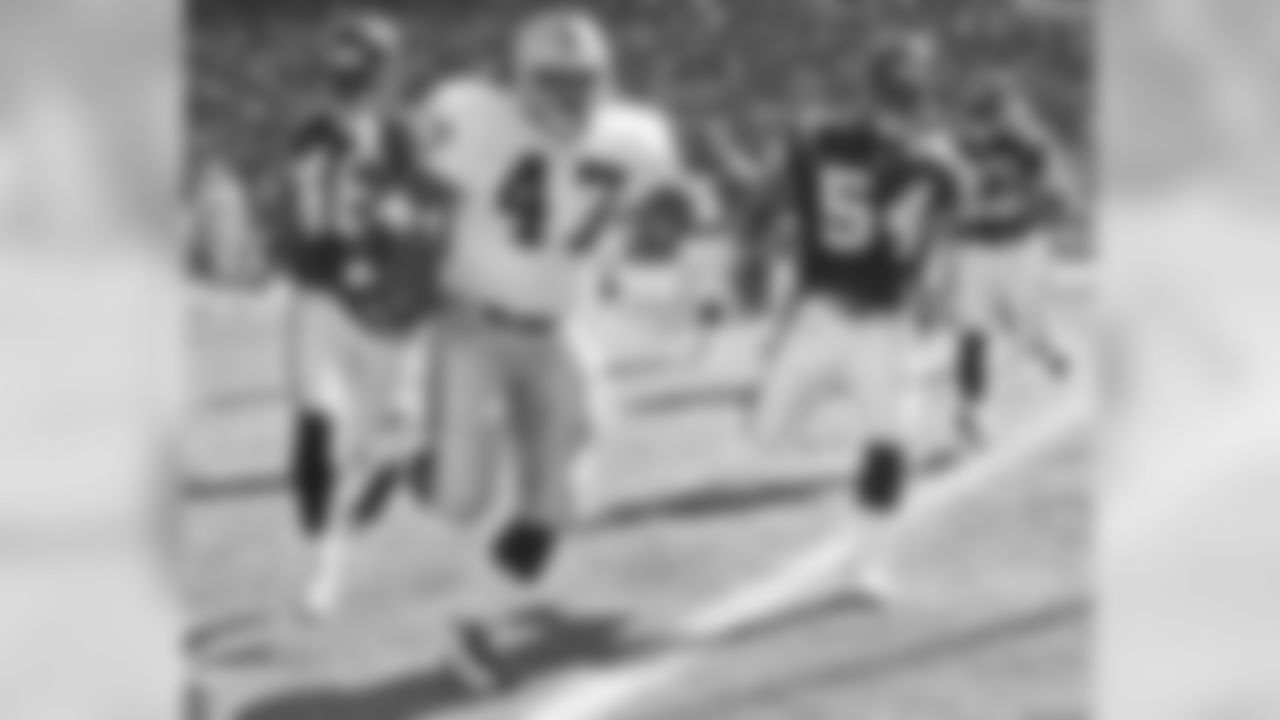 Tyrone Wheatley rumbles towards the end zone during a 2004 match-up against the Chargers.