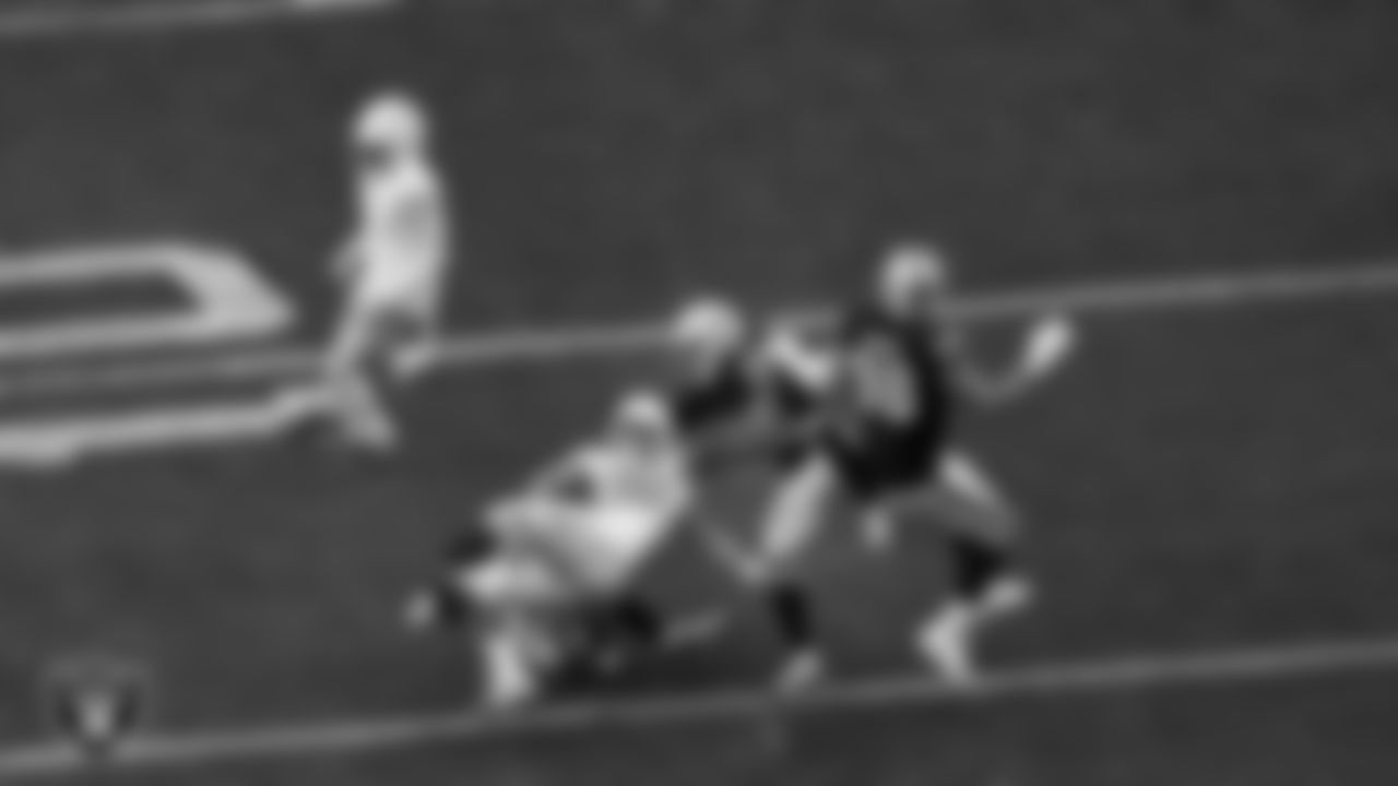 Las Vegas Raiders safety Tre'von Moehrig (25) makes a tackle during the regular season home game against the Los Angeles Chargers at Allegiant Stadium.