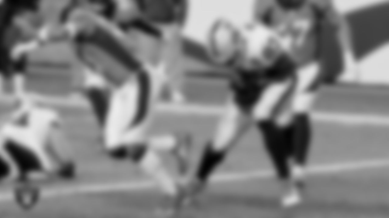 Las Vegas Raiders tight end Darren Waller (83) makes a catch for a 2-point conversion during the regular season away game against the Denver Broncos.