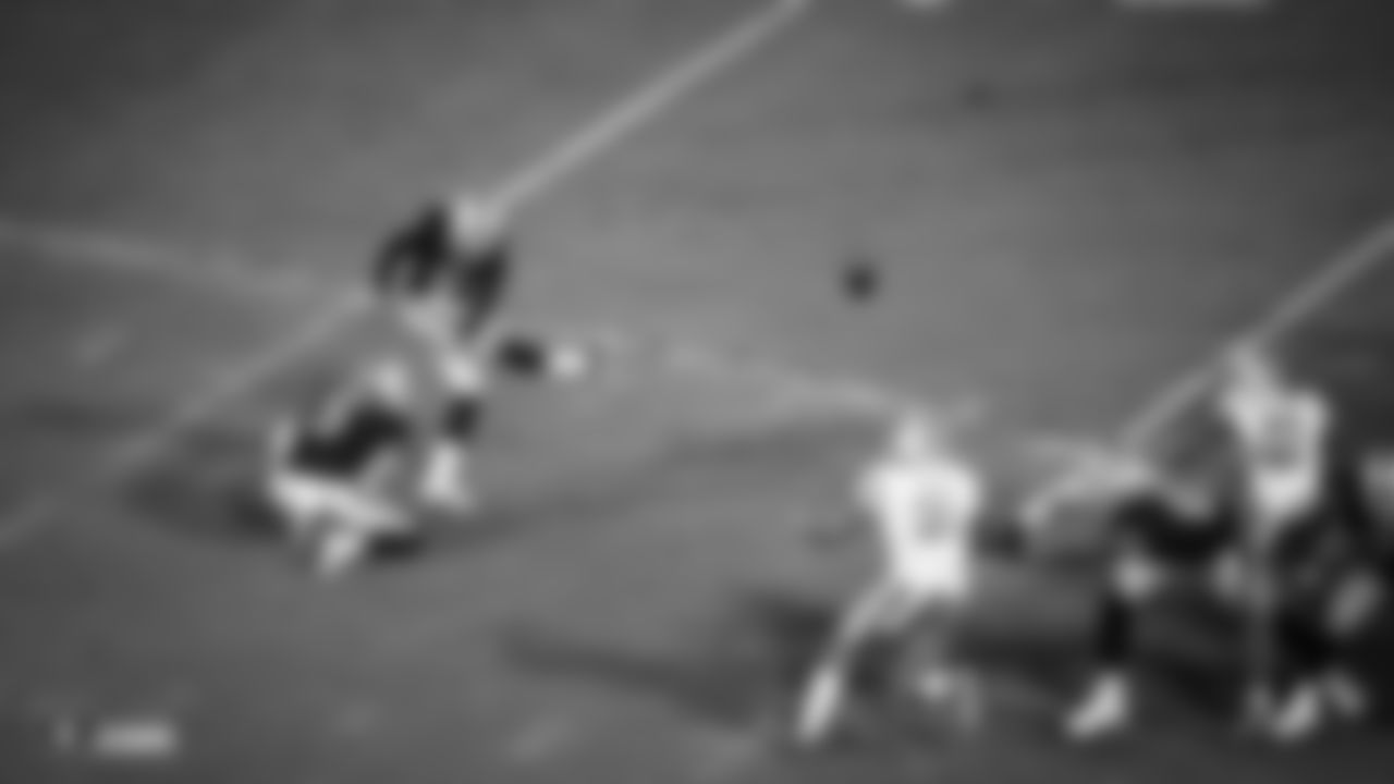 Oakland Raiders punter Johnny Townsend (5) holds for kicker Eddy Piñeiro (9) during a field goal attempt during The Oakland Raiders game against the Detroit Lions at Oakland-Alameda County Coliseum, Friday, August 10, 2018, in Oakland, California. The Oakland Raiders won 16-10.